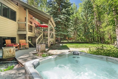 Riverfront single-family homes in Aspen are as rare as powder on Aspen Golf Club in Colorado - for sale on GolfHomes.com, golf home, golf lot