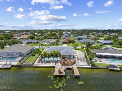 ***Rare Find! Stunning Lakefront Pool Home in SE Cape Coral - A on El Rio Golf Course and Club in Florida - for sale on GolfHomes.com, golf home, golf lot