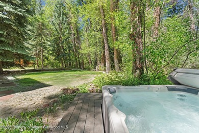Riverfront single-family homes in Aspen are as rare as powder on Aspen Golf Club in Colorado - for sale on GolfHomes.com, golf home, golf lot
