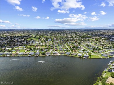 ***Rare Find! Stunning Lakefront Pool Home in SE Cape Coral - A on El Rio Golf Course and Club in Florida - for sale on GolfHomes.com, golf home, golf lot