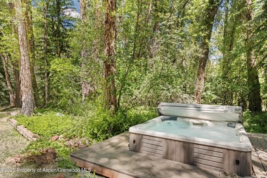 Riverfront single-family homes in Aspen are as rare as powder on Aspen Golf Club in Colorado - for sale on GolfHomes.com, golf home, golf lot