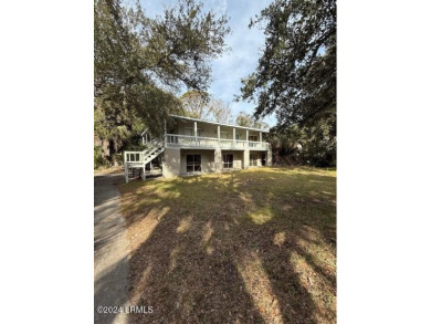 This brick home offers a fantastic opportunity for buyers on Ocean Point Golf Links in South Carolina - for sale on GolfHomes.com, golf home, golf lot