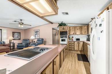 Well maintained home with open & spacious floorplan in the on Apache Wells Country Club in Arizona - for sale on GolfHomes.com, golf home, golf lot