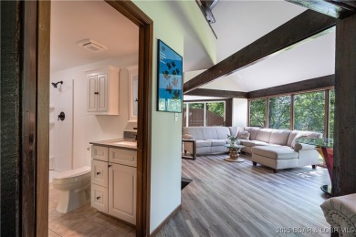 Tucked among mature trees, this unique beautifully updated on Seasons Ridge At Four Seasons in Missouri - for sale on GolfHomes.com, golf home, golf lot