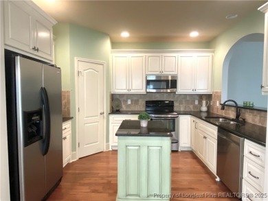 LOW MAINTENANCE LIVING CARRIAGE HOME IN GATED ANDERSON CREEK on Anderson Creek Golf Club in North Carolina - for sale on GolfHomes.com, golf home, golf lot