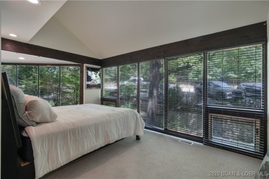 Tucked among mature trees, this unique beautifully updated on Seasons Ridge At Four Seasons in Missouri - for sale on GolfHomes.com, golf home, golf lot