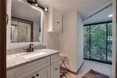 Tucked among mature trees, this unique beautifully updated on Seasons Ridge At Four Seasons in Missouri - for sale on GolfHomes.com, golf home, golf lot