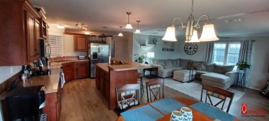 Come settle down and relax in a beautiful manufactured home with on Fairways Country Club in Florida - for sale on GolfHomes.com, golf home, golf lot