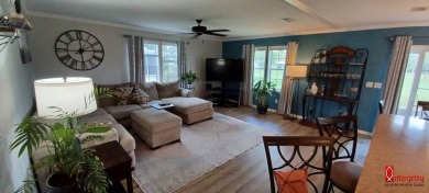 Come settle down and relax in a beautiful manufactured home with on Fairways Country Club in Florida - for sale on GolfHomes.com, golf home, golf lot