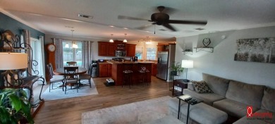 Come settle down and relax in a beautiful manufactured home with on Fairways Country Club in Florida - for sale on GolfHomes.com, golf home, golf lot