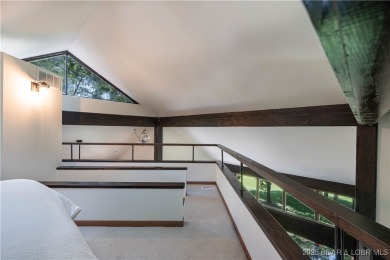 Tucked among mature trees, this unique beautifully updated on Seasons Ridge At Four Seasons in Missouri - for sale on GolfHomes.com, golf home, golf lot