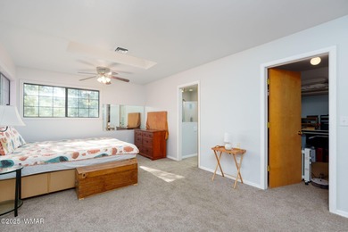 Tucked among towering pines, this inviting cabin offers the calm on Torreon Golf Club in Arizona - for sale on GolfHomes.com, golf home, golf lot