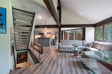 Tucked among mature trees, this unique beautifully updated on Seasons Ridge At Four Seasons in Missouri - for sale on GolfHomes.com, golf home, golf lot