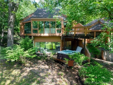 Tucked among mature trees, this unique beautifully updated on Seasons Ridge At Four Seasons in Missouri - for sale on GolfHomes.com, golf home, golf lot