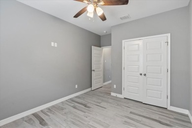 heck out this amazing island home, built in 2018! It offers 4 on Padre Isles Golf Course in Texas - for sale on GolfHomes.com, golf home, golf lot