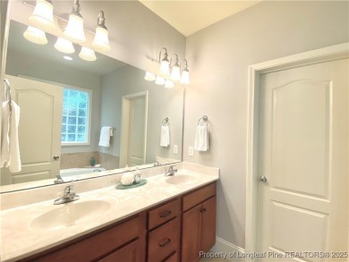 LOW MAINTENANCE LIVING CARRIAGE HOME IN GATED ANDERSON CREEK on Anderson Creek Golf Club in North Carolina - for sale on GolfHomes.com, golf home, golf lot