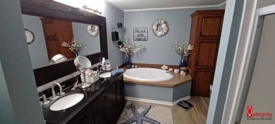 Come settle down and relax in a beautiful manufactured home with on Fairways Country Club in Florida - for sale on GolfHomes.com, golf home, golf lot