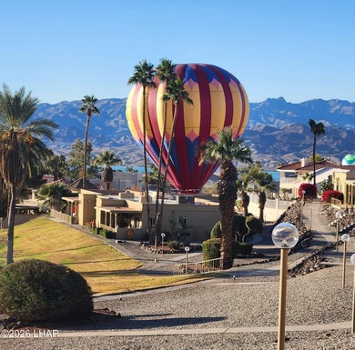 This absolutely a must see beautiful townhouse on the 12th green on London Bridge Golf Course in Arizona - for sale on GolfHomes.com, golf home, golf lot