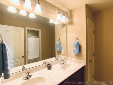 LOW MAINTENANCE LIVING CARRIAGE HOME IN GATED ANDERSON CREEK on Anderson Creek Golf Club in North Carolina - for sale on GolfHomes.com, golf home, golf lot