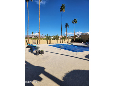 This absolutely a must see beautiful townhouse on the 12th green on London Bridge Golf Course in Arizona - for sale on GolfHomes.com, golf home, golf lot