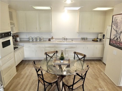 Charming and expanded one-bedroom, one-bathroom cottage nestled on Leisure World Seal Beach Golf Course in California - for sale on GolfHomes.com, golf home, golf lot