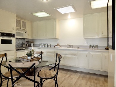 Charming and expanded one-bedroom, one-bathroom cottage nestled on Leisure World Seal Beach Golf Course in California - for sale on GolfHomes.com, golf home, golf lot
