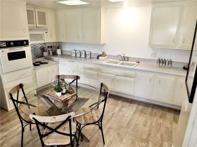 Charming and expanded one-bedroom, one-bathroom cottage nestled on Leisure World Seal Beach Golf Course in California - for sale on GolfHomes.com, golf home, golf lot