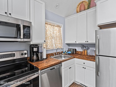 Welcome to this beautifully remodeled chalet-style home on Pocono Farms Country Club in Pennsylvania - for sale on GolfHomes.com, golf home, golf lot