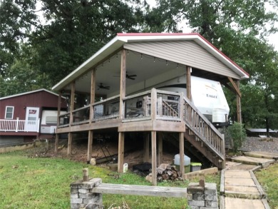 This 2008 31' Jayco RV w/ a custom-built covered structure on The Tillery Tradition Country Club in North Carolina - for sale on GolfHomes.com, golf home, golf lot