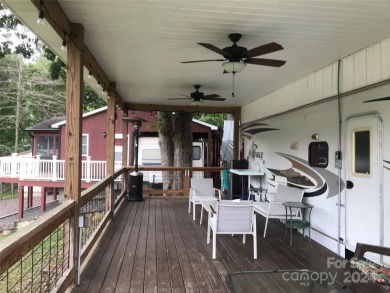 This 2008 31' Jayco RV w/ a custom-built covered structure on The Tillery Tradition Country Club in North Carolina - for sale on GolfHomes.com, golf home, golf lot