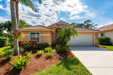 Beautifully landscaped 3 bedroom, 2 bath home located on a on Champions Club at Summerfield in Florida - for sale on GolfHomes.com, golf home, golf lot