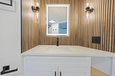 Welcome to the highly desirable Shore Acres neighborhood, where on Mangrove Bay Golf Course in Florida - for sale on GolfHomes.com, golf home, golf lot