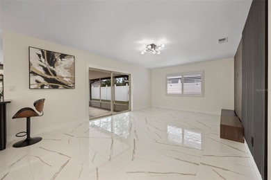 Welcome to the highly desirable Shore Acres neighborhood, where on Mangrove Bay Golf Course in Florida - for sale on GolfHomes.com, golf home, golf lot