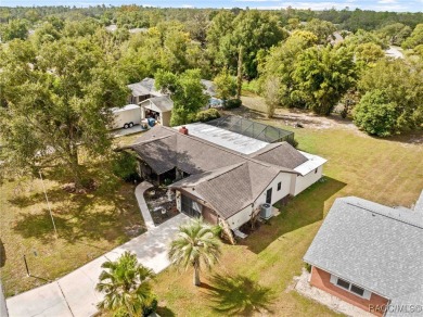 Beautifully Maintained 3-Bedroom, 2-Bath Pool Home with Scenic on Heather Golf and Country Club in Florida - for sale on GolfHomes.com, golf home, golf lot