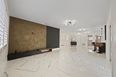 Welcome to the highly desirable Shore Acres neighborhood, where on Mangrove Bay Golf Course in Florida - for sale on GolfHomes.com, golf home, golf lot