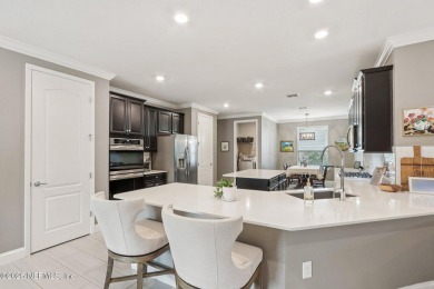 Welcome to this meticulously maintained 4-bedroom, 3-bathroom on The Palencia Club in Florida - for sale on GolfHomes.com, golf home, golf lot