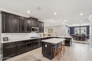 Welcome to this meticulously maintained 4-bedroom, 3-bathroom on The Palencia Club in Florida - for sale on GolfHomes.com, golf home, golf lot