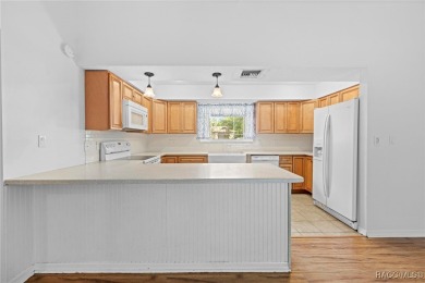 Beautifully Maintained 3-Bedroom, 2-Bath Pool Home with Scenic on Heather Golf and Country Club in Florida - for sale on GolfHomes.com, golf home, golf lot