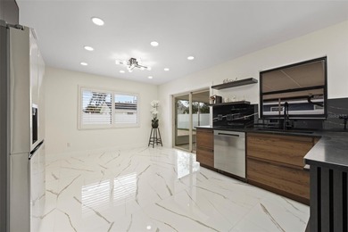 Welcome to the highly desirable Shore Acres neighborhood, where on Mangrove Bay Golf Course in Florida - for sale on GolfHomes.com, golf home, golf lot