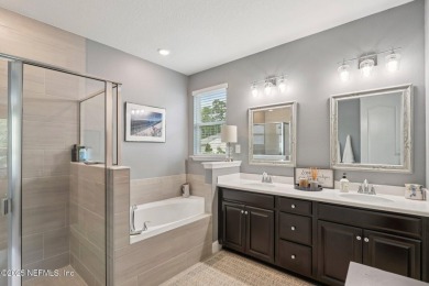 Welcome to this meticulously maintained 4-bedroom, 3-bathroom on The Palencia Club in Florida - for sale on GolfHomes.com, golf home, golf lot