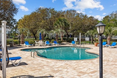 The perfect beach and golf getaway--just one traffic light from on Myrtlewood Golf Course and Club  in South Carolina - for sale on GolfHomes.com, golf home, golf lot