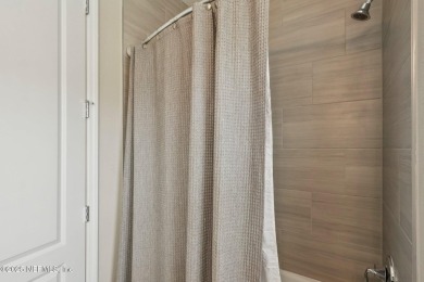 Welcome to this meticulously maintained 4-bedroom, 3-bathroom on The Palencia Club in Florida - for sale on GolfHomes.com, golf home, golf lot