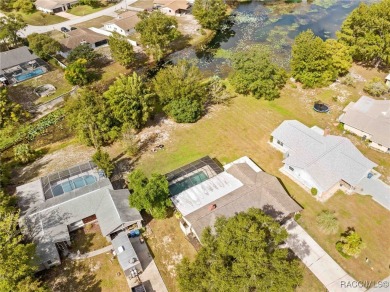 Beautifully Maintained 3-Bedroom, 2-Bath Pool Home with Scenic on Heather Golf and Country Club in Florida - for sale on GolfHomes.com, golf home, golf lot