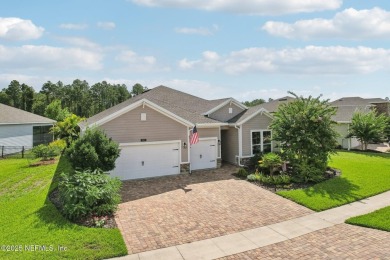 Welcome to this meticulously maintained 4-bedroom, 3-bathroom on The Palencia Club in Florida - for sale on GolfHomes.com, golf home, golf lot
