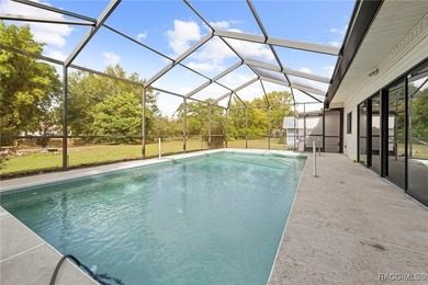 Beautifully Maintained 3-Bedroom, 2-Bath Pool Home with Scenic on Heather Golf and Country Club in Florida - for sale on GolfHomes.com, golf home, golf lot
