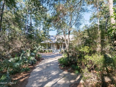 Infused with Southern charm, this custom-built home seamlessly on Old Tabby Links on Spring Island in South Carolina - for sale on GolfHomes.com, golf home, golf lot