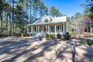 Infused with Southern charm, this custom-built home seamlessly on Old Tabby Links on Spring Island in South Carolina - for sale on GolfHomes.com, golf home, golf lot