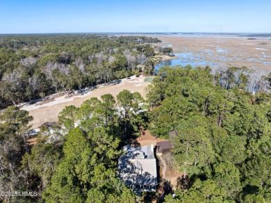 Infused with Southern charm, this custom-built home seamlessly on Old Tabby Links on Spring Island in South Carolina - for sale on GolfHomes.com, golf home, golf lot