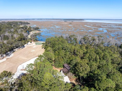 Infused with Southern charm, this custom-built home seamlessly on Old Tabby Links on Spring Island in South Carolina - for sale on GolfHomes.com, golf home, golf lot