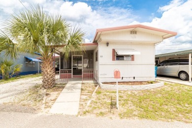 Nestled along the serene shores of Lake Smart, this charming on  in Florida - for sale on GolfHomes.com, golf home, golf lot